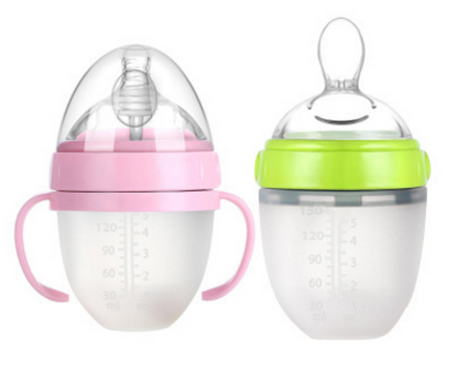 Baby's bottle with spoon