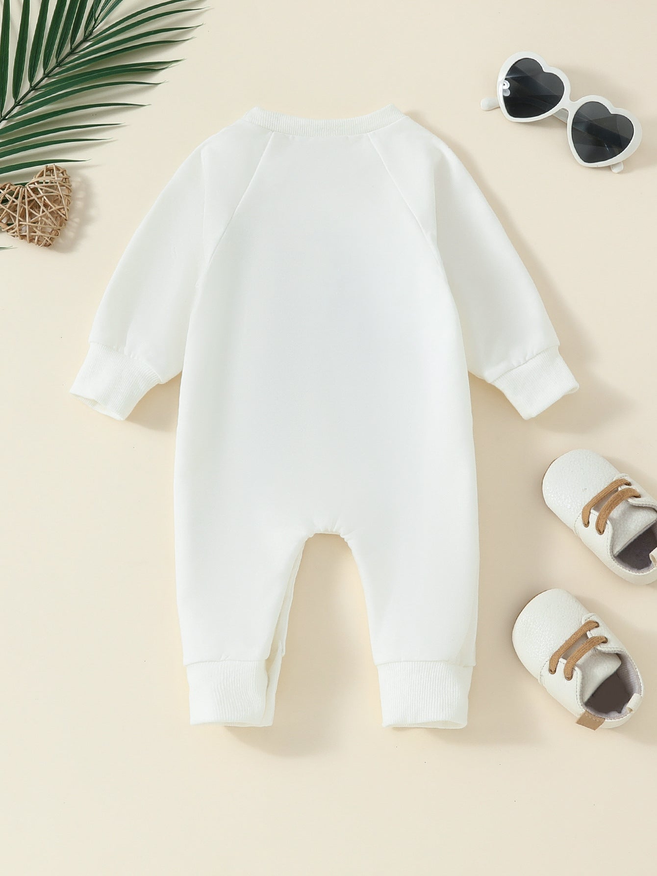 Tiny Trekkers Snuggle Suit: Long-Sleeve Love-Inspired Baby Romper